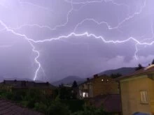 Brown Concrete House Under Lightning