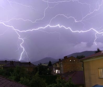 Brown Concrete House Under Lightning