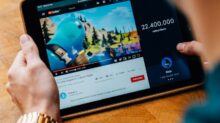 selective focus photography of person using tablet computer