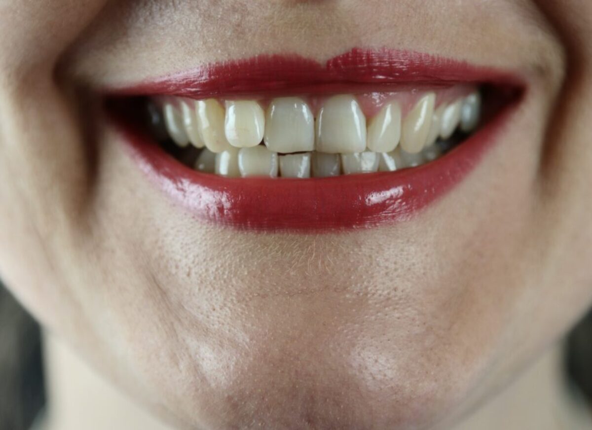 person with red lipstick and red lipstick