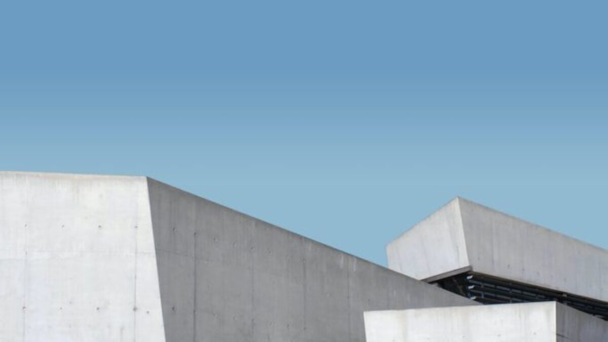 white concrete building under blue sky during daytime
