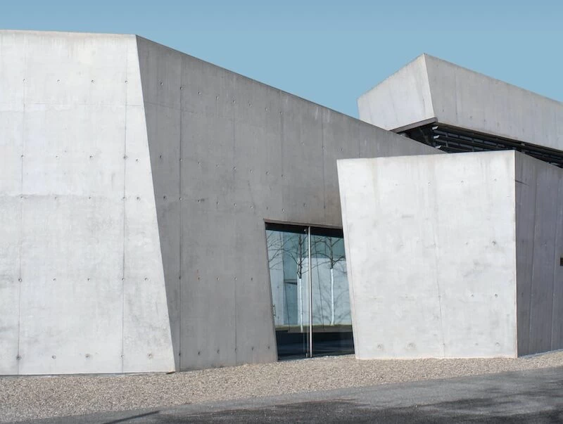white concrete building under blue sky during daytime