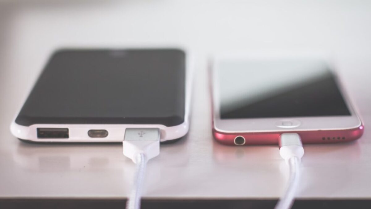 two phones on white table
