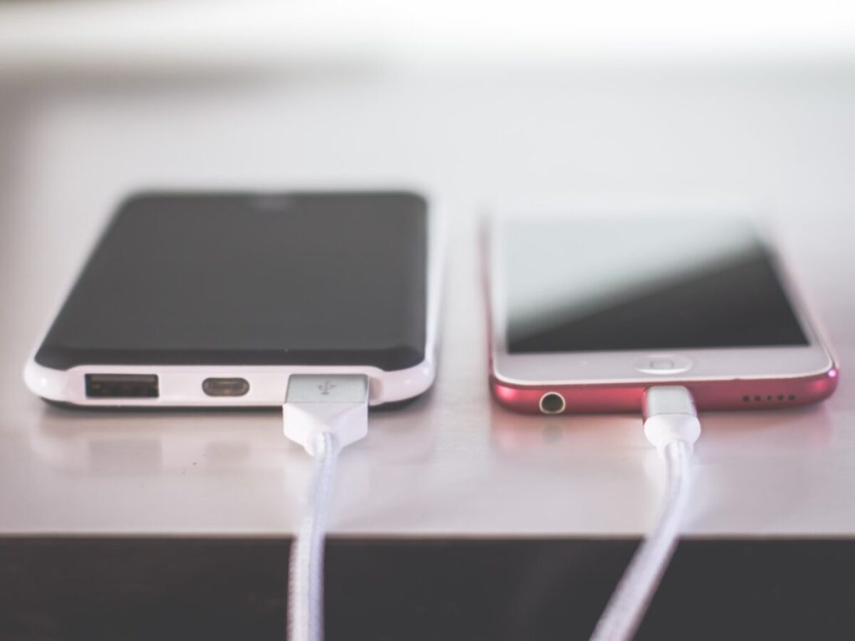 two phones on white table