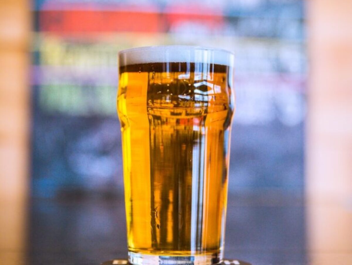 shallow focus photography of clear beer glass