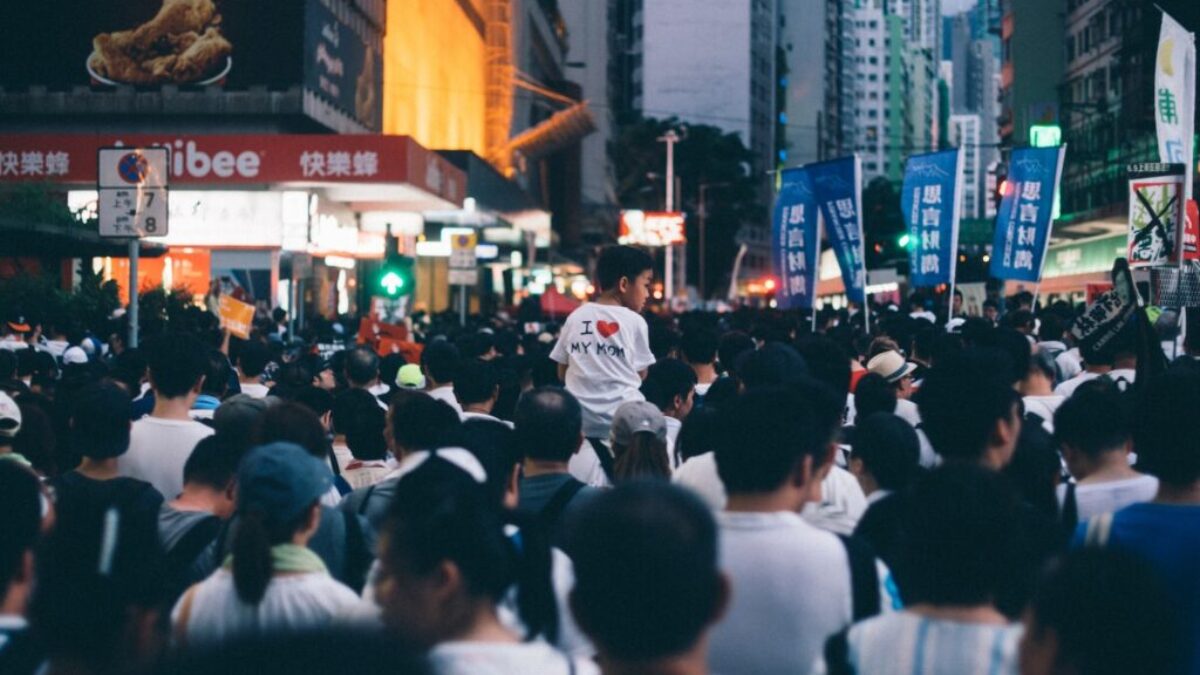 group of people standing near building