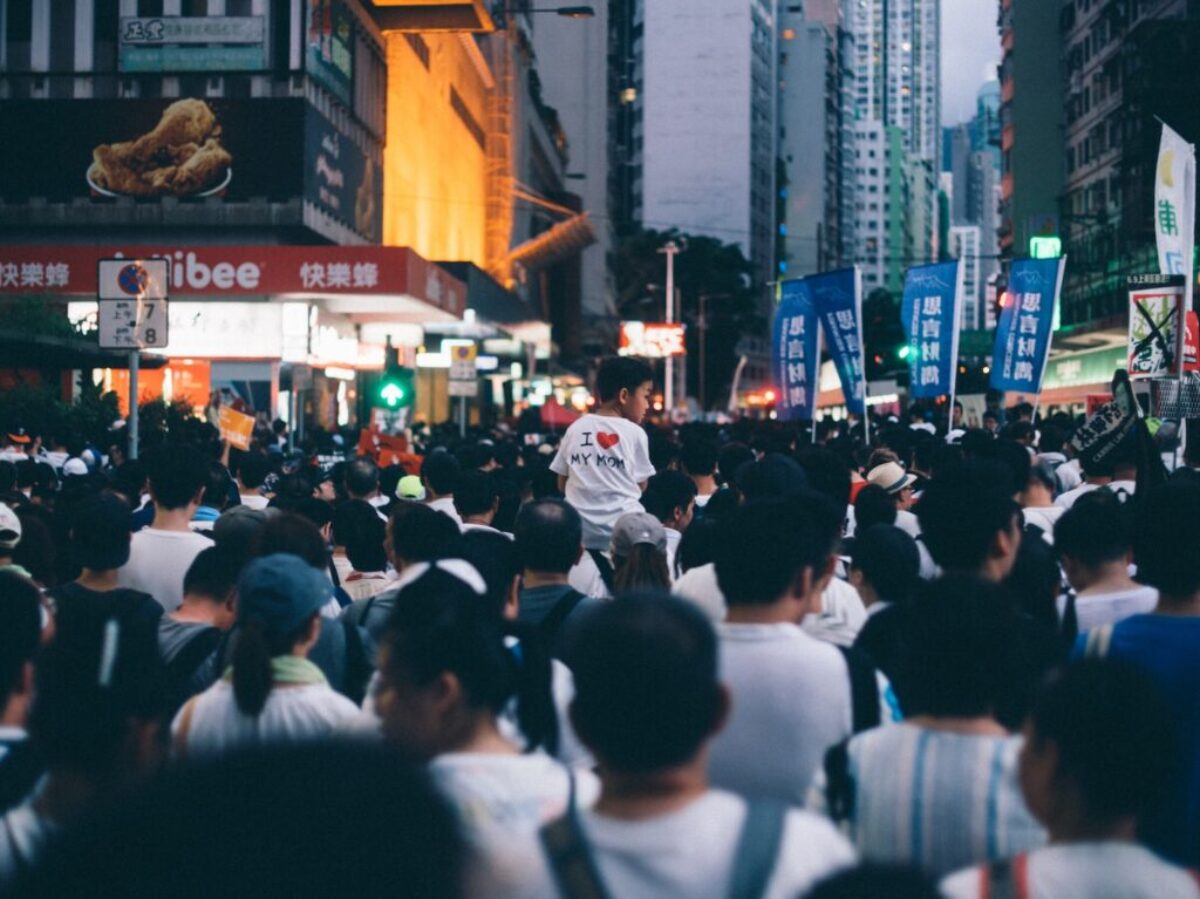 group of people standing near building