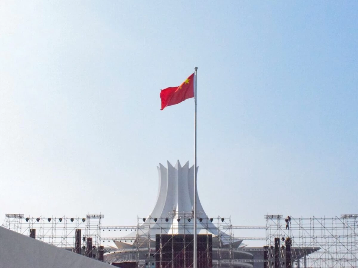 red white and blue flag on pole during daytime