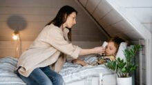 A Mother Caring for Her Sick Child