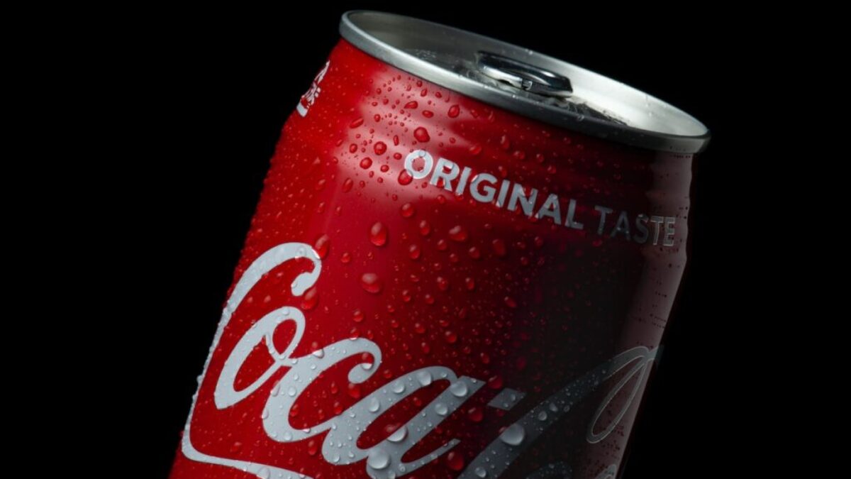 coca cola can on black background