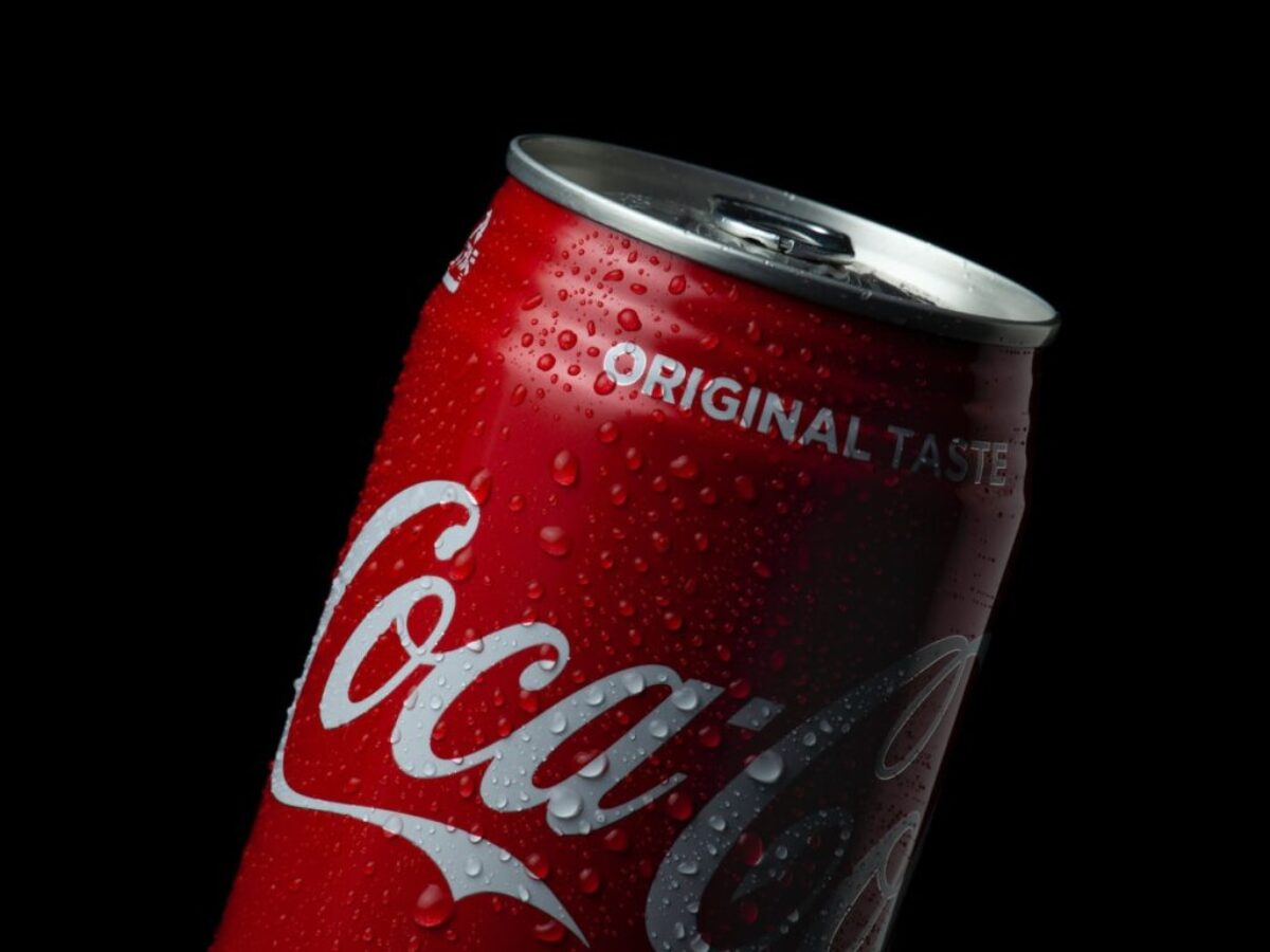 coca cola can on black background
