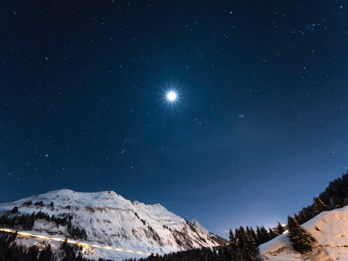 white mountain under starry night
