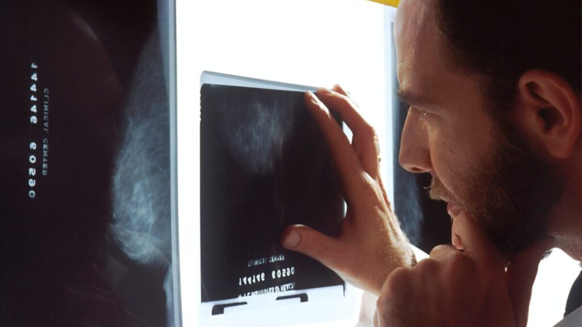 person holding black tablet computer