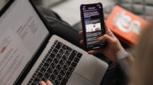 person holding black iphone 4