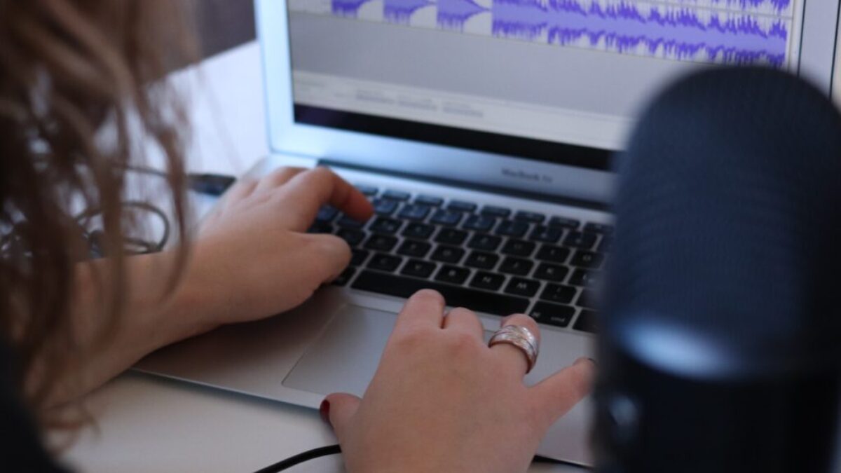 woman using MacBook Air in room