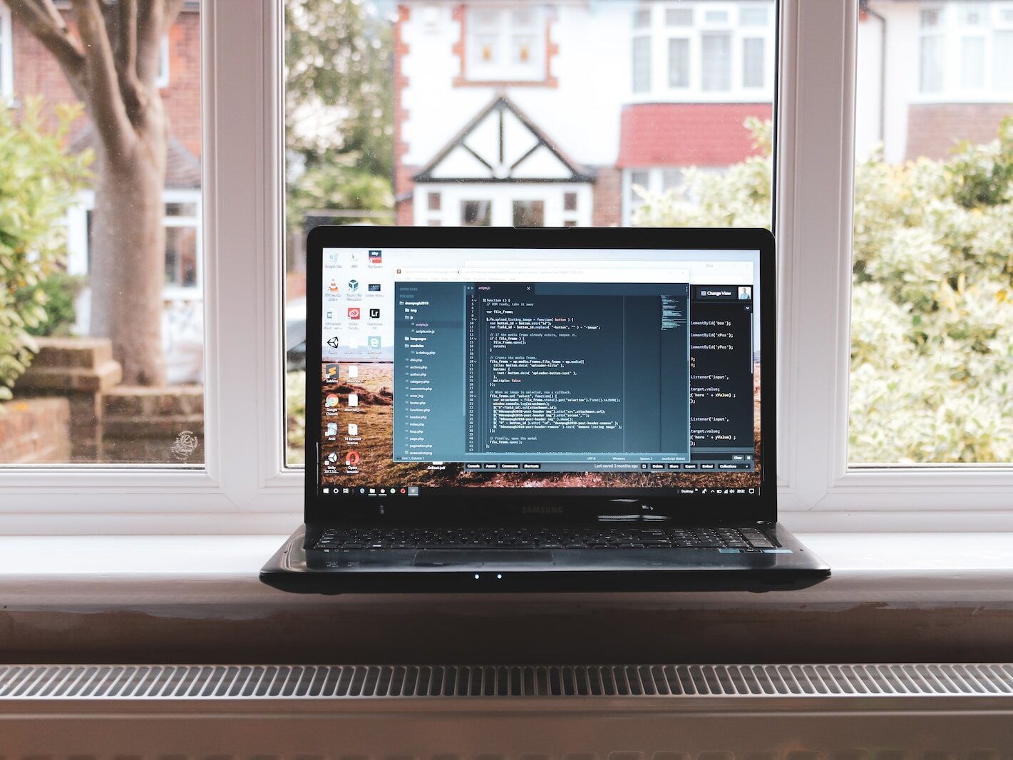 black laptop computer turned on