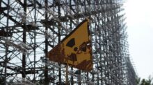 yellow and black stop sign