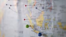 world map with pins