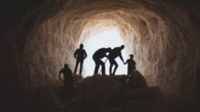 photo of people in cave