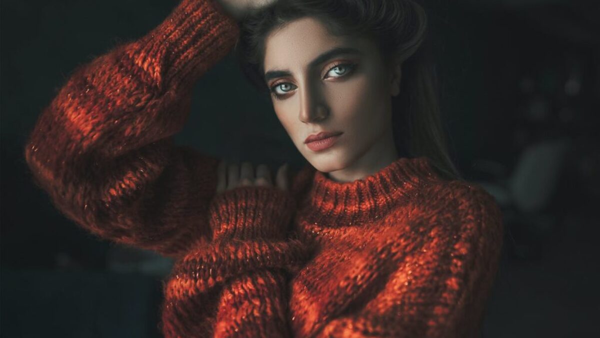 Beautiful woman in a red sweater