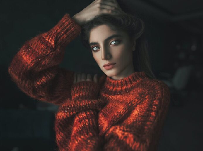 Beautiful woman in a red sweater