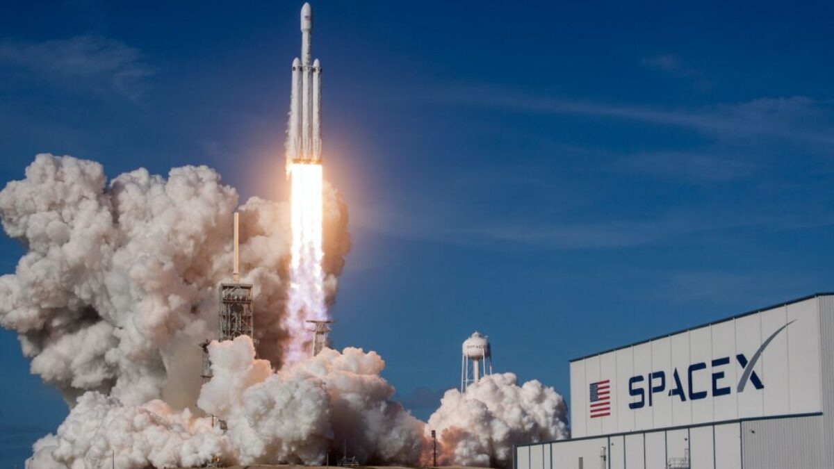 rocket ship launching during daytime