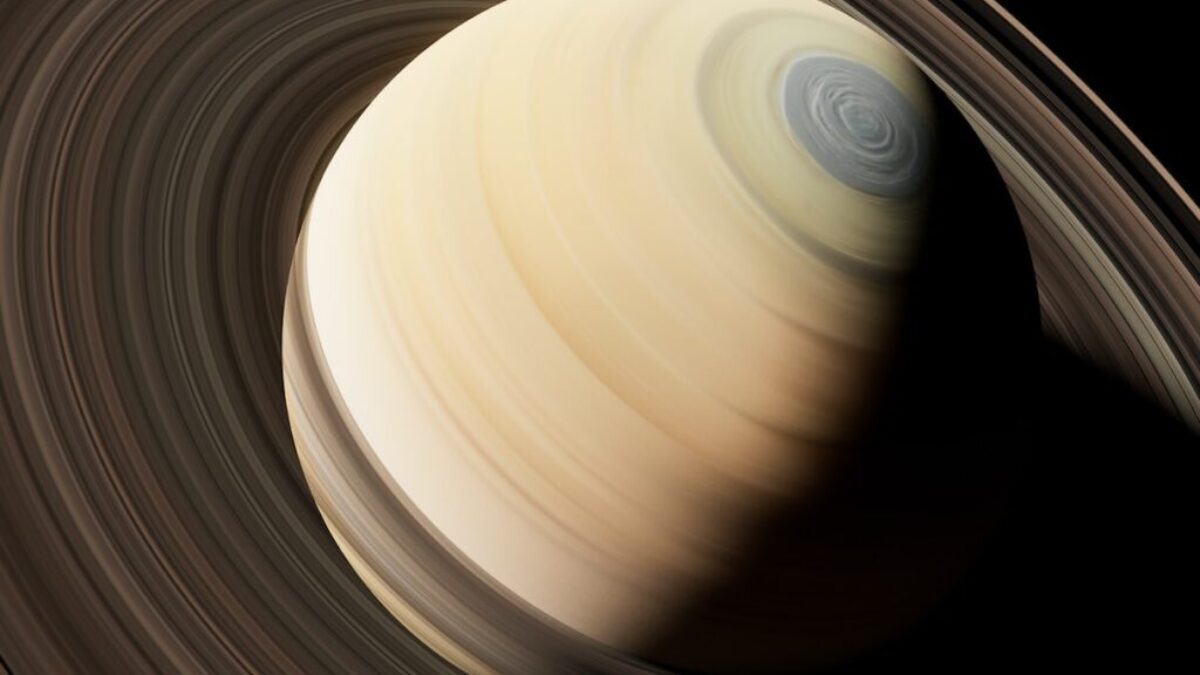 a close up of a saturn planet with a black background