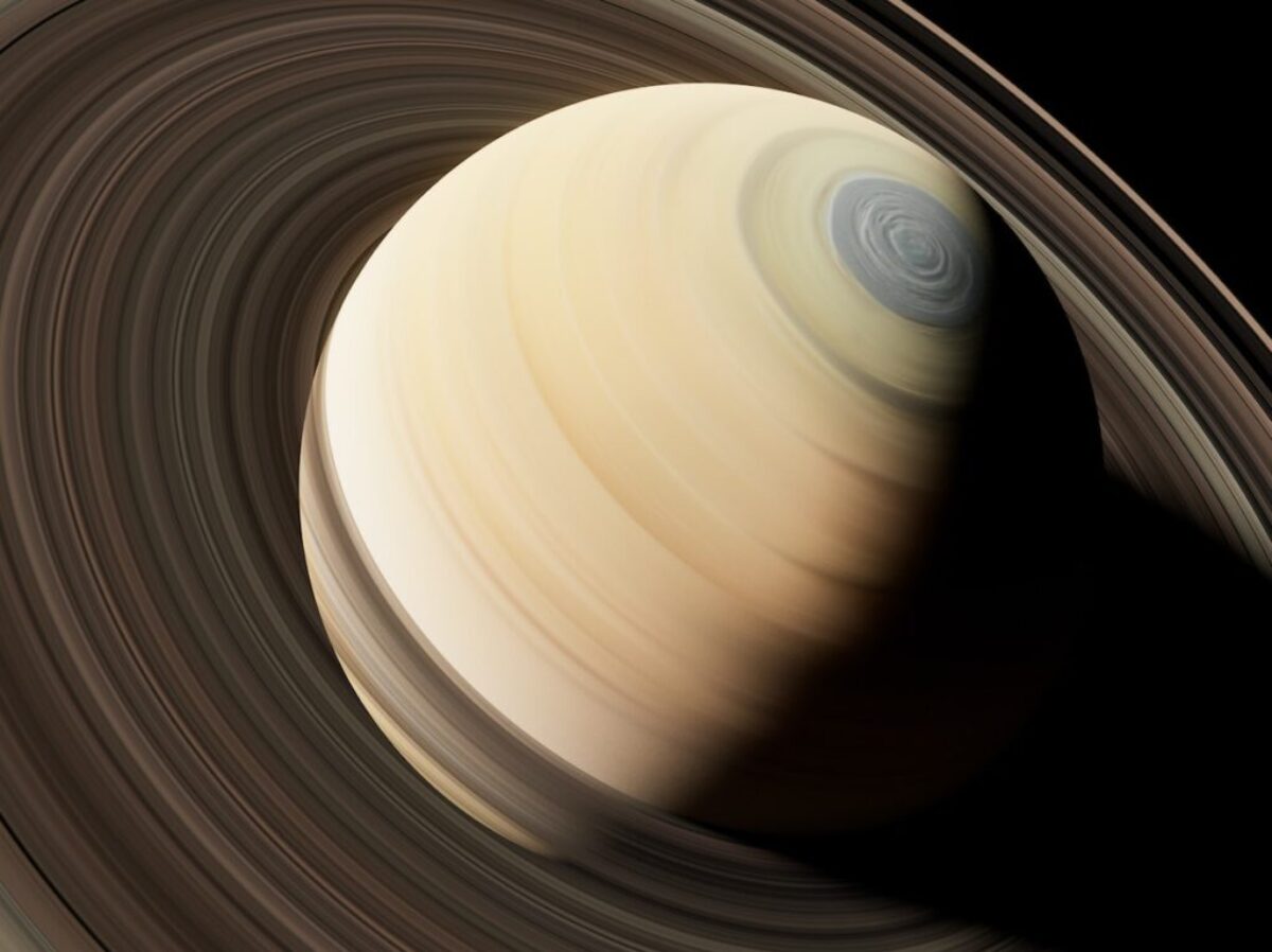 a close up of a saturn planet with a black background