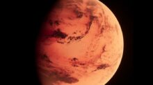 a red planet with a black background