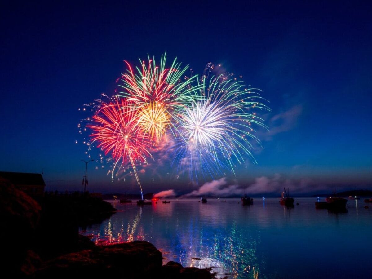 green, red, and white fireworks on sky at nighttime