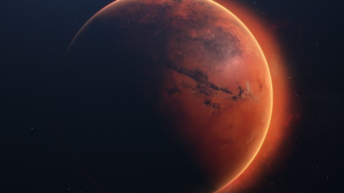 a red planet with a star in the background
