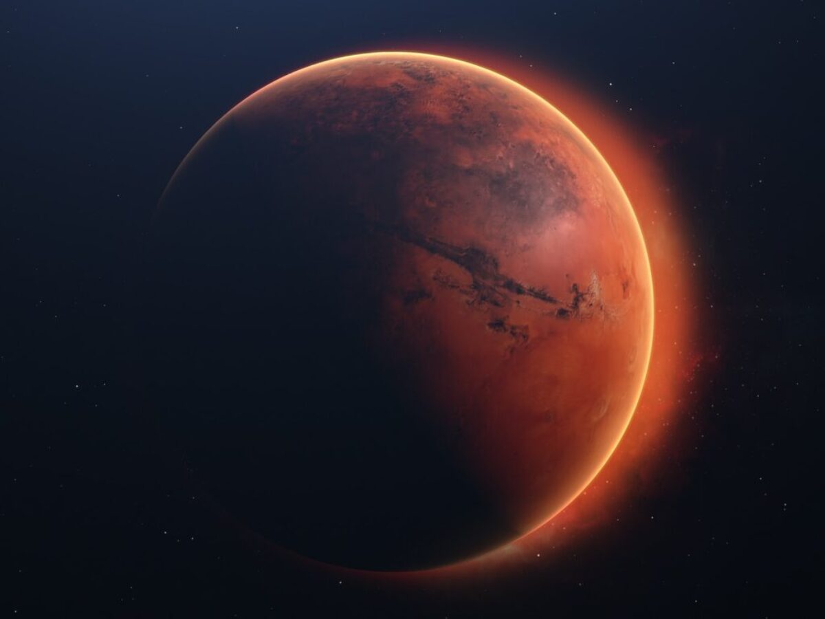 a red planet with a star in the background