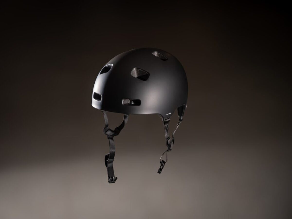 a black helmet with holes on the side of it