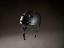 a black helmet with holes on the side of it