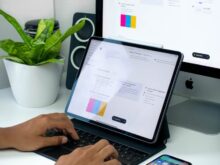 person using black and silver laptop computer