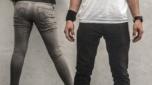 man in black pants beside woman in gray skinny jeans