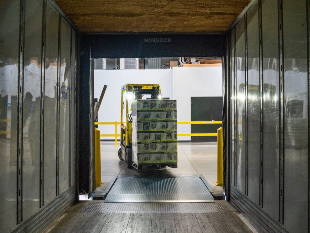 yellow and black forklift during daytime