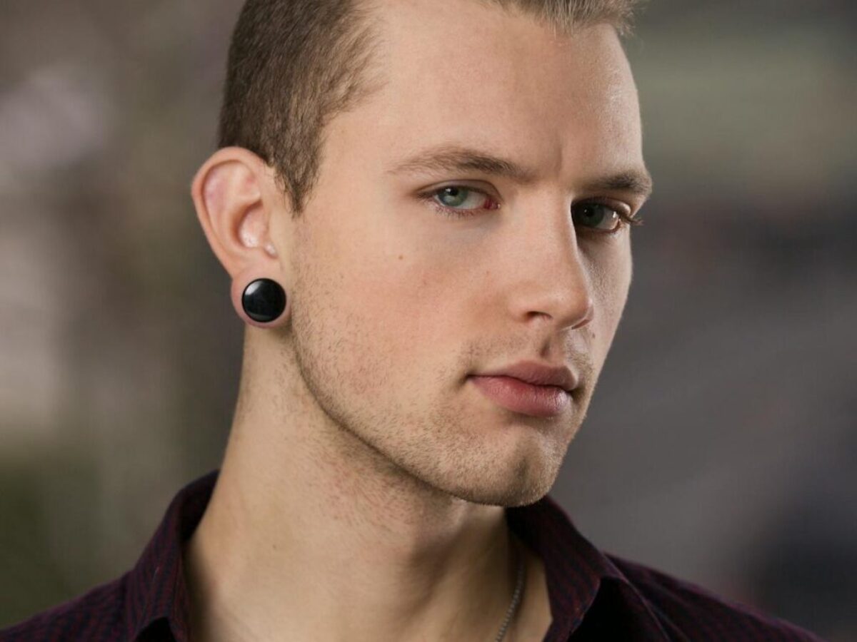 Man Wearing Maroon Collared Shirt