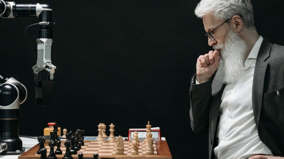 Elderly Man Thinking while Looking at a Chessboard