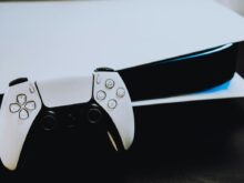 a close up of two video game controllers