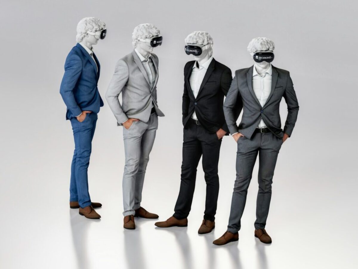a group of three men in suits and masks