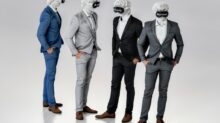 a group of three men in suits and masks