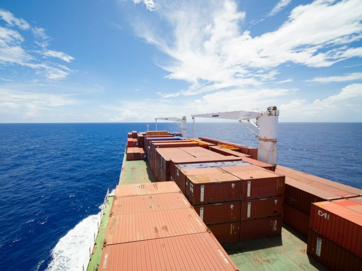 brown wooden dock on blue sea under blue sky during daytime