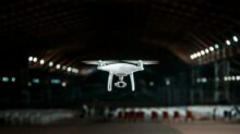 white drone in a building