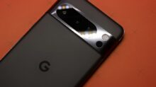 a close up of a cell phone on a table