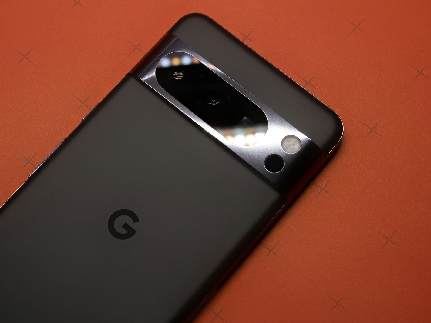a close up of a cell phone on a table