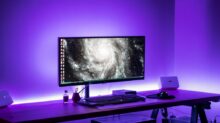 flat screen computer monitor on brown computer desk