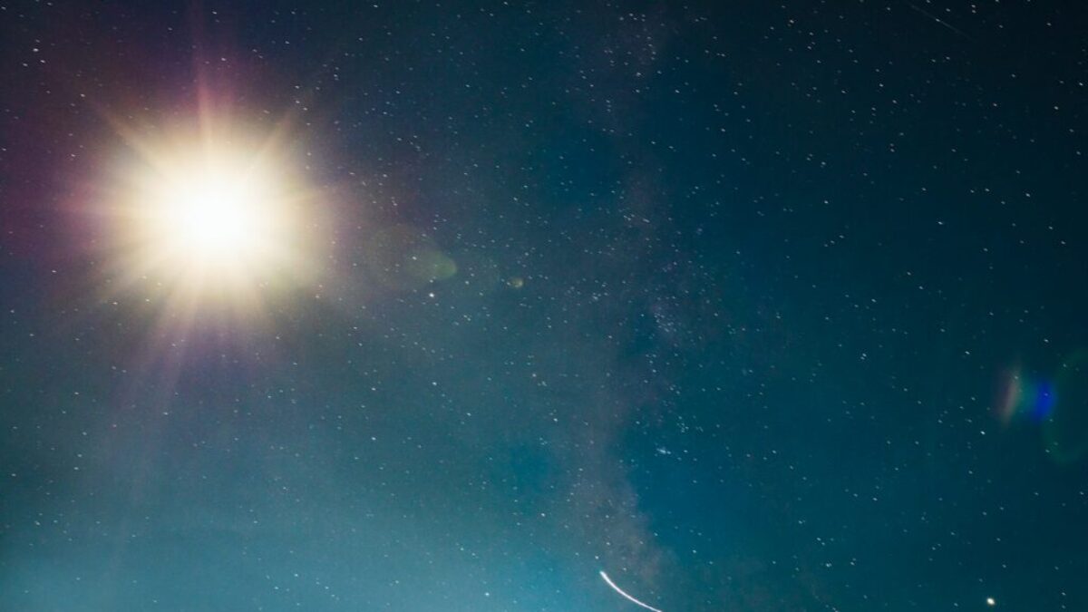 silhouette of mountain under blue sky during night time