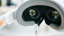a close up of a pair of glasses attached to a device