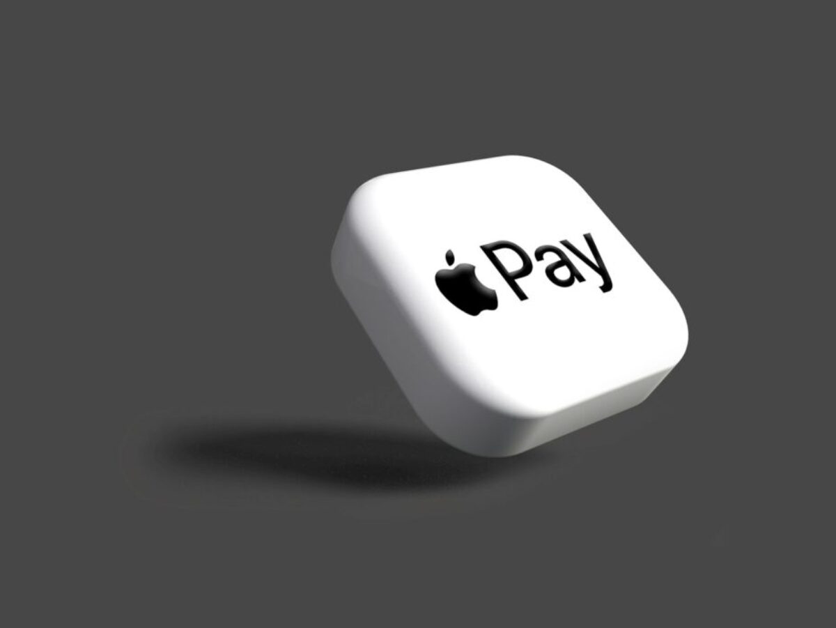 a white dice with the word pay on it